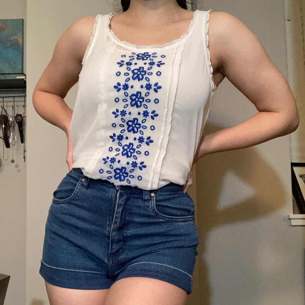 Hollister white top with floral blue flowers